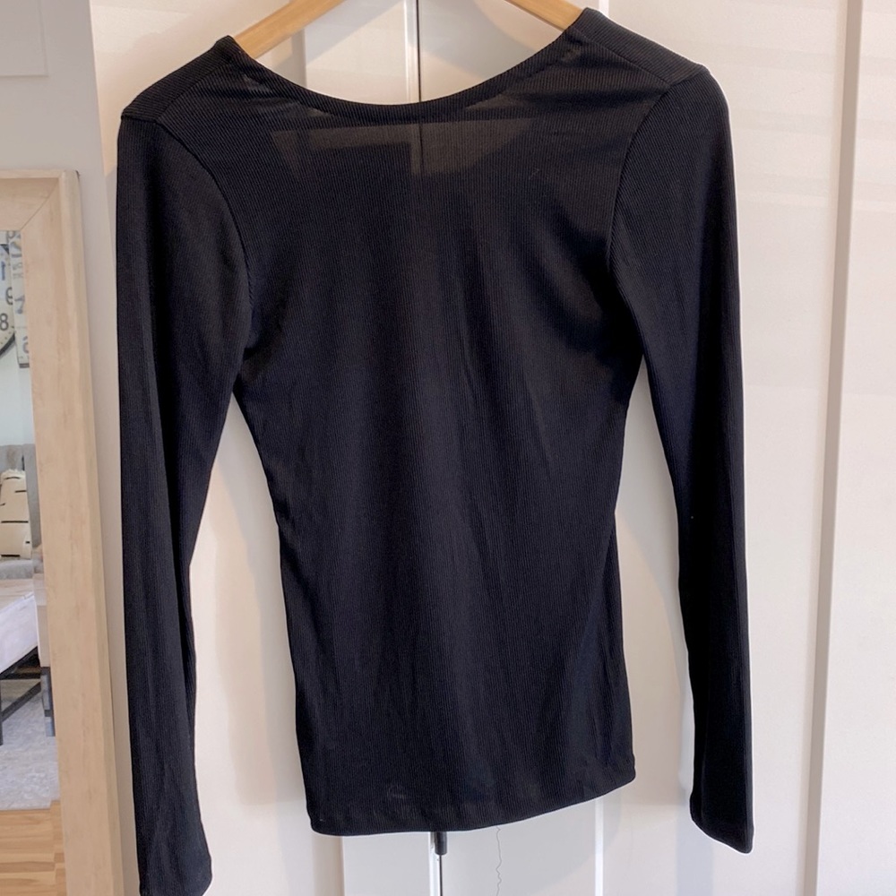 Club Monaco black top. Drop back